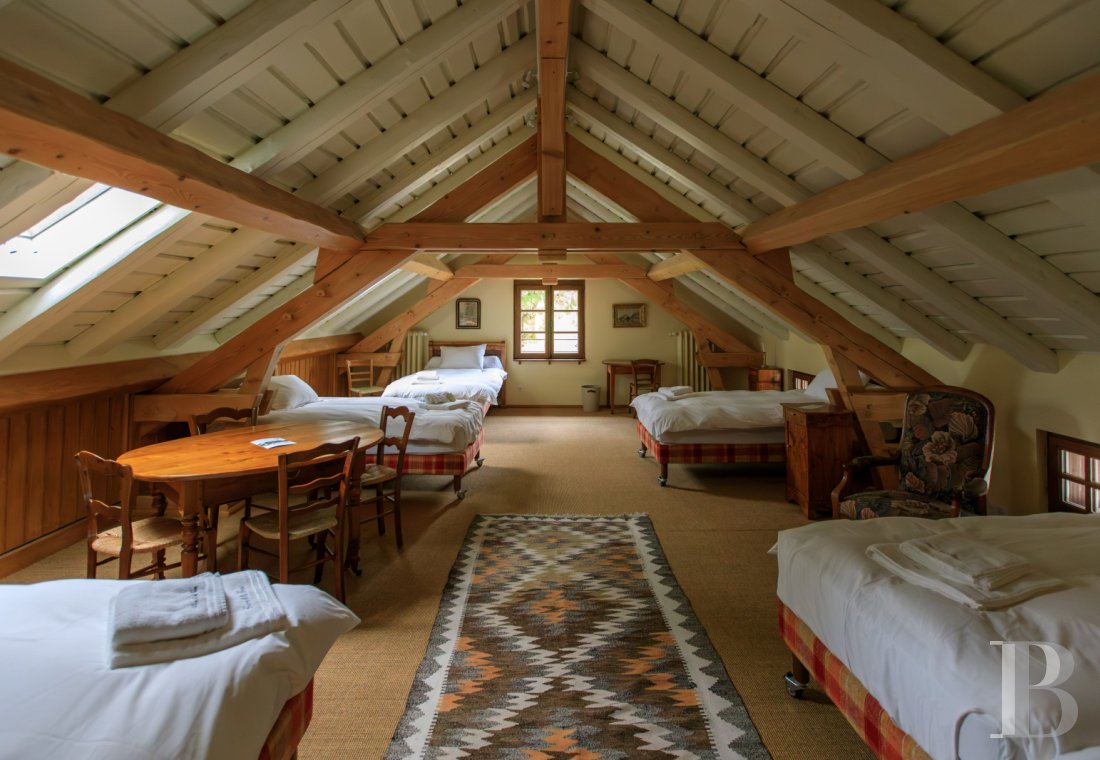 A former livestock farm which has been transformed into a vast, comfortable home near to Nantua in the Haut-Bugey region - photo  n°33